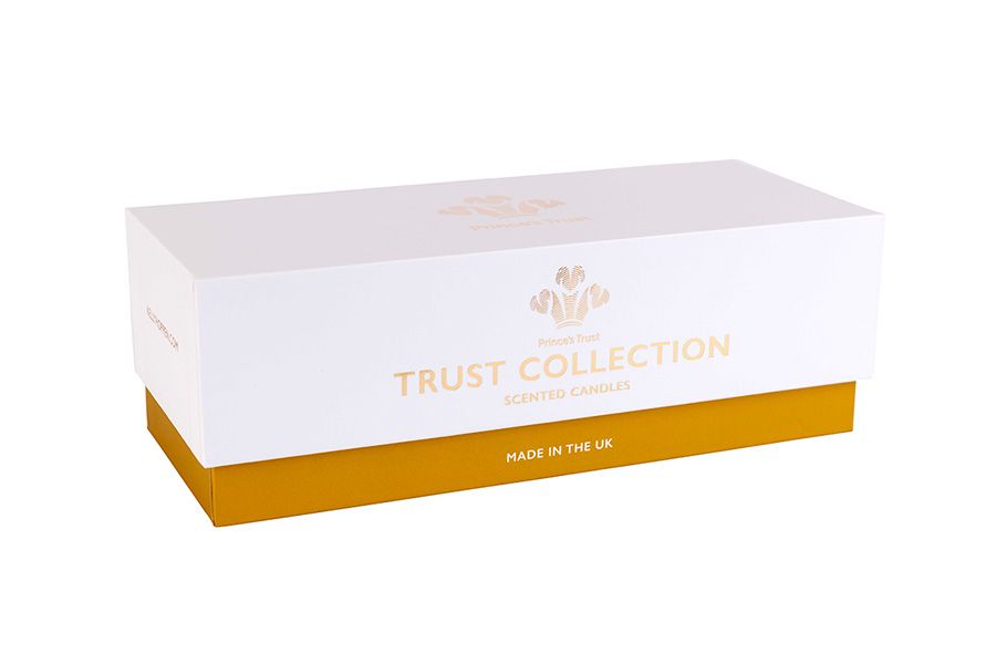 Shoe-style printed rigid Candle box with gold base, white lid and a foiled logo on the front.